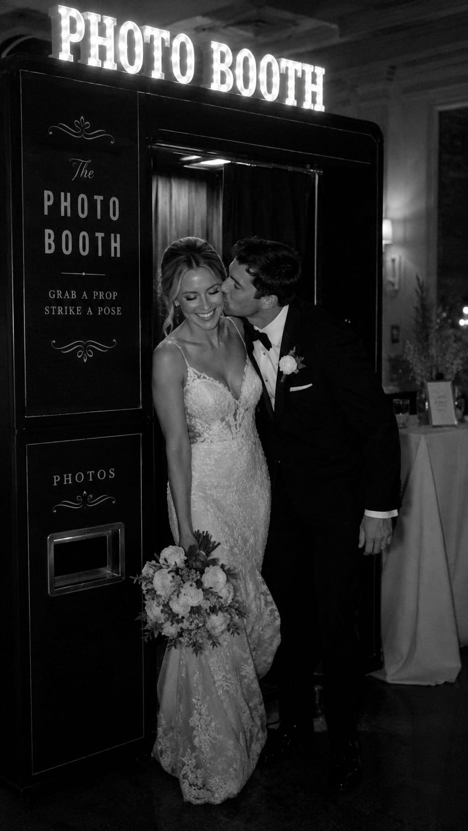 Black-and-White Photo Booth Exit Kiss